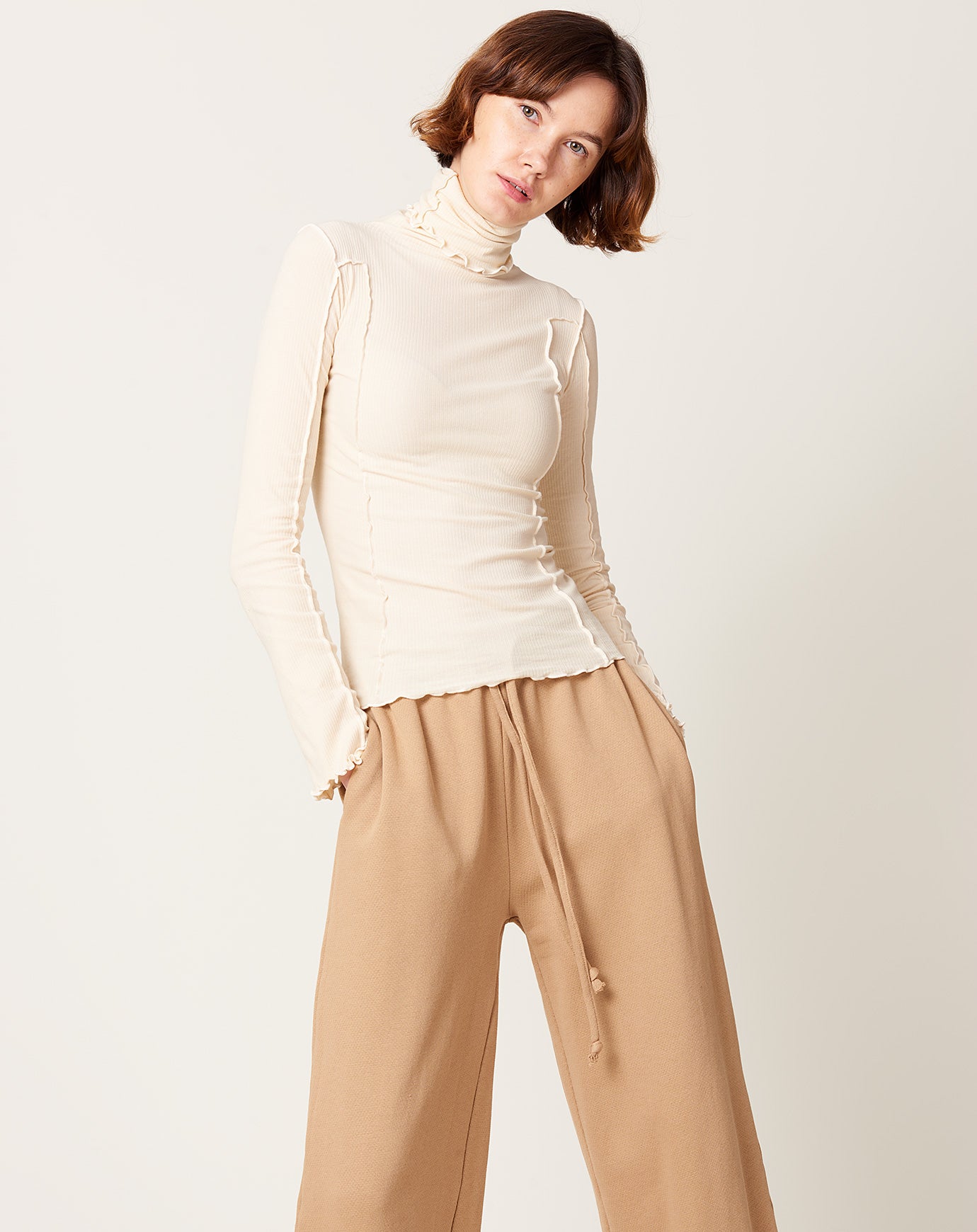 Baserange Omato Turtleneck in Off White