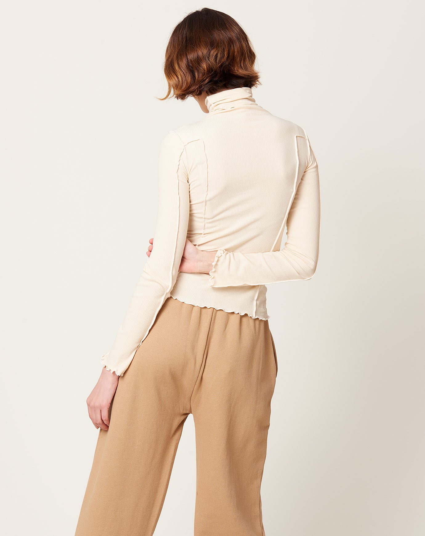 Baserange Omato Turtleneck in Off White