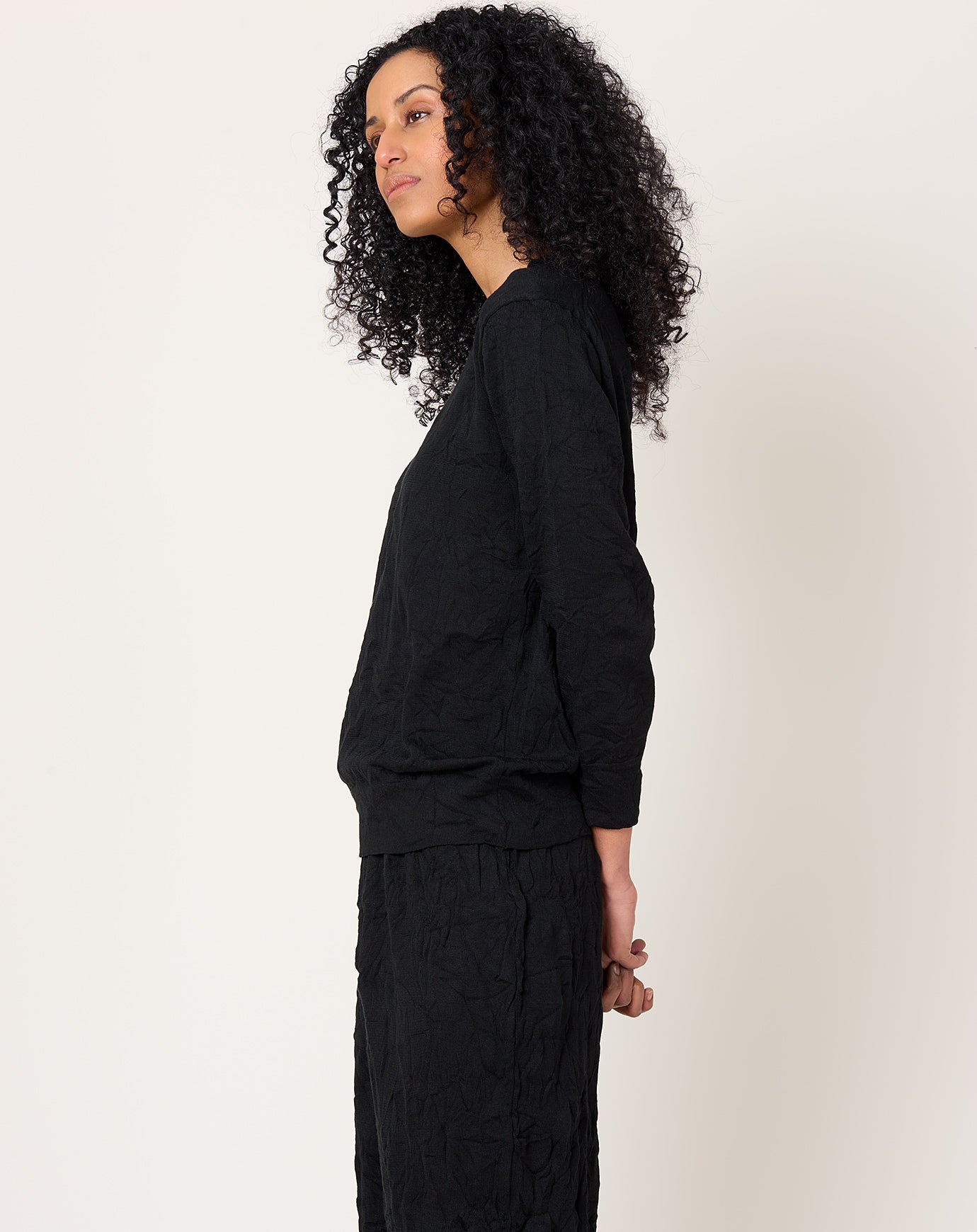 Black Crane Crinkled Summer Knit Top in Black