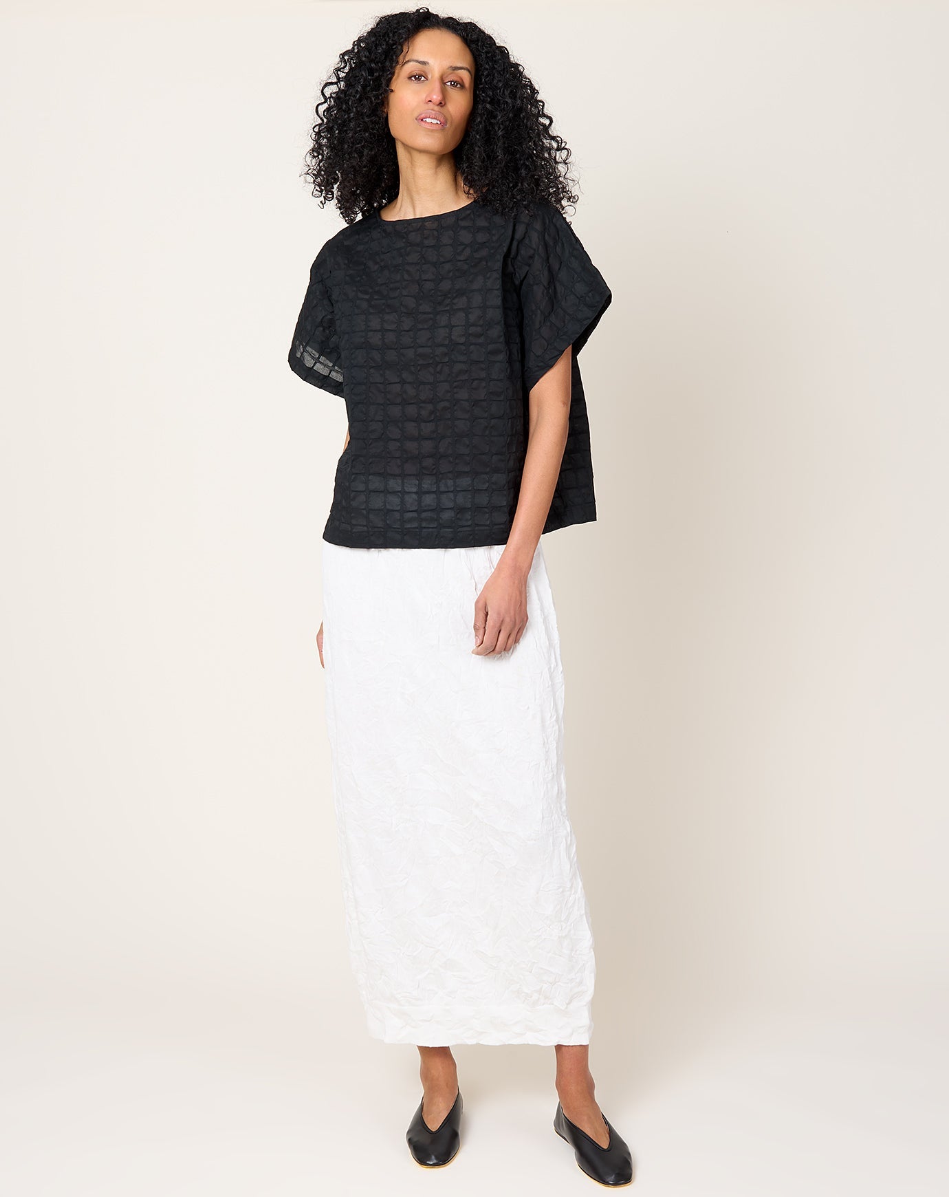 Black Crane Ripple Finish Top in Black