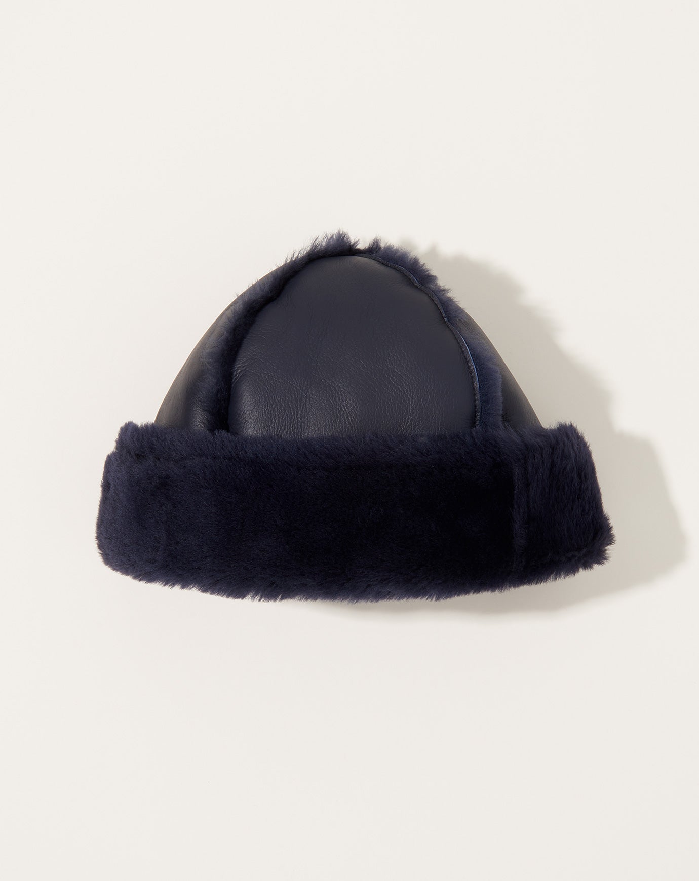 Cawley Sheepskin Seam Leather Hat in Navy