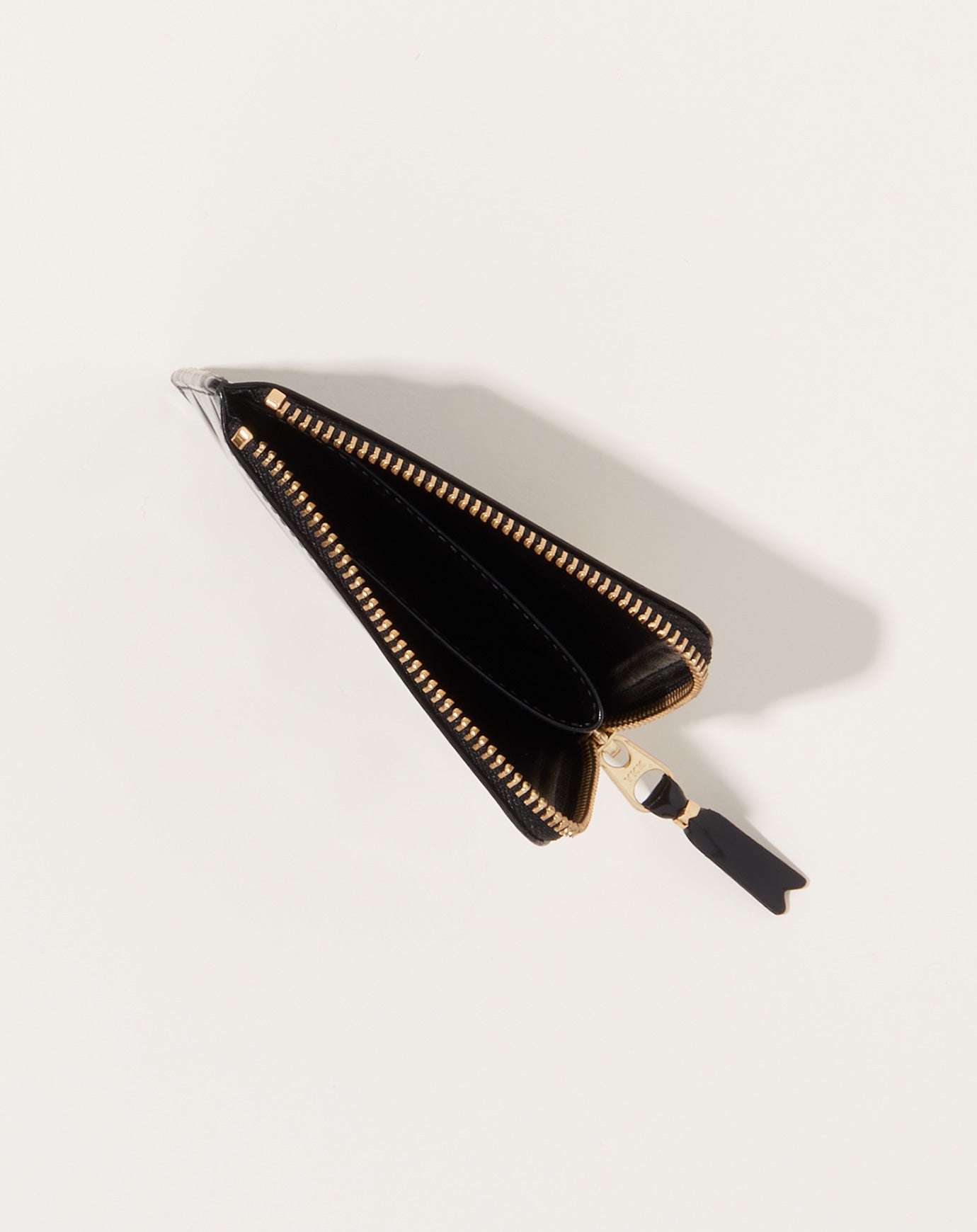 Comme des Garçons  Polka Dots Embossed Zip Around Wallet in Black