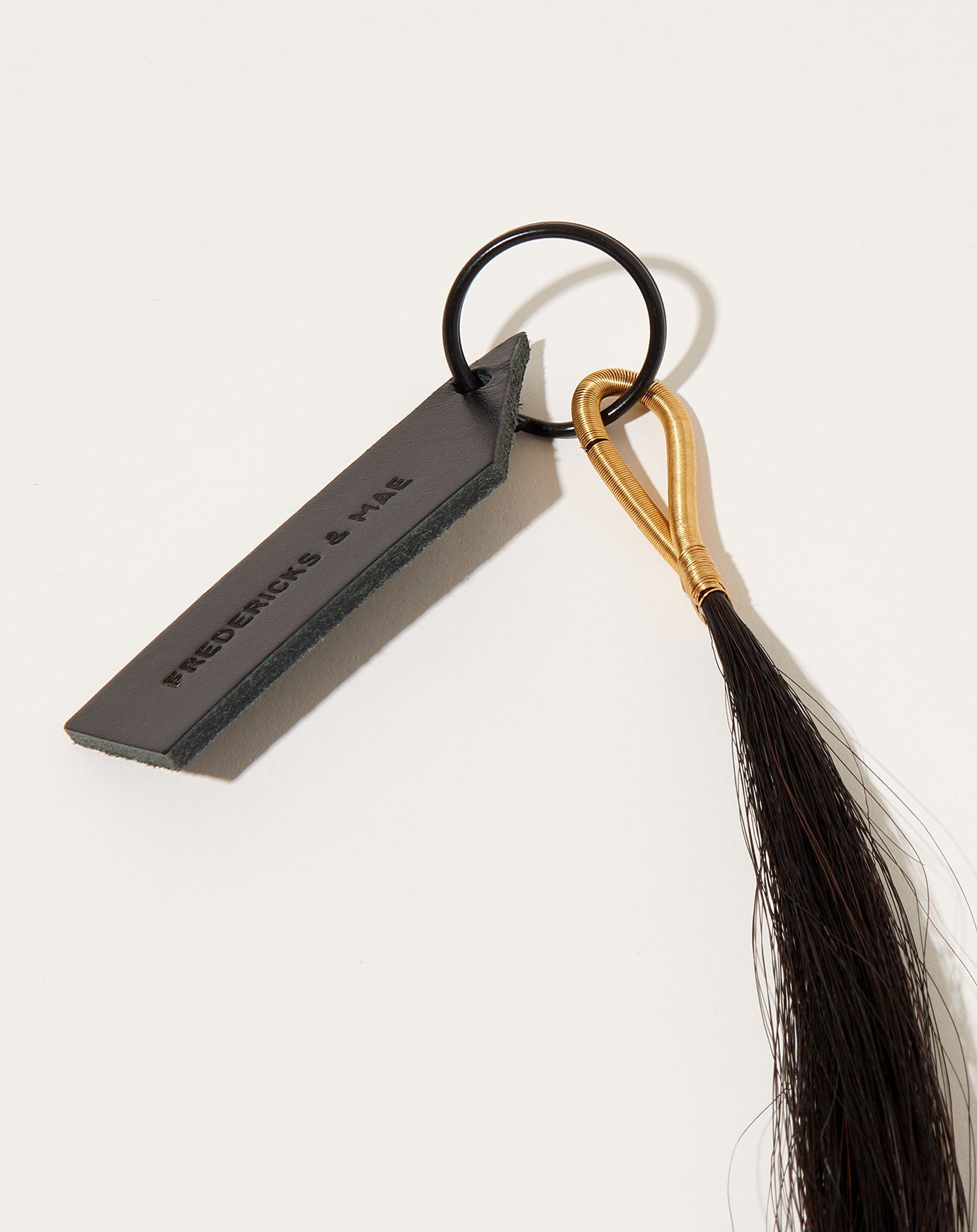 Fredericks & Mae Wire Tassel Keychain in Brass/Black