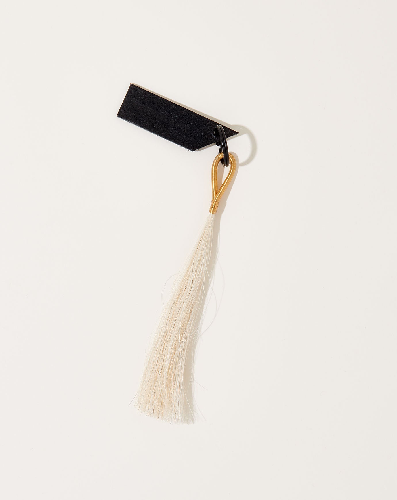 Fredericks & Mae Wire Tassel Keychain in Brass/White