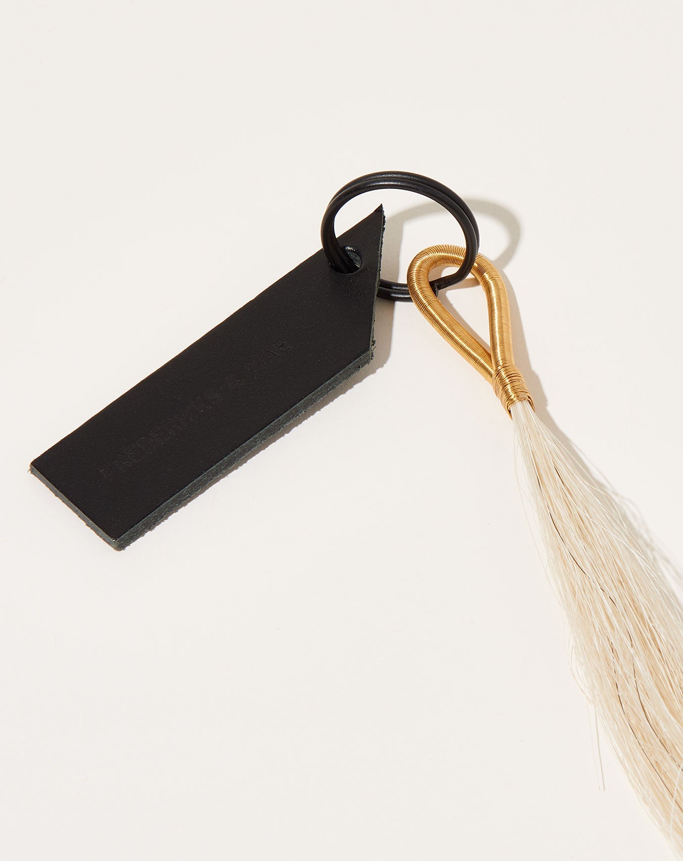 Fredericks & Mae Wire Tassel Keychain in Brass/White