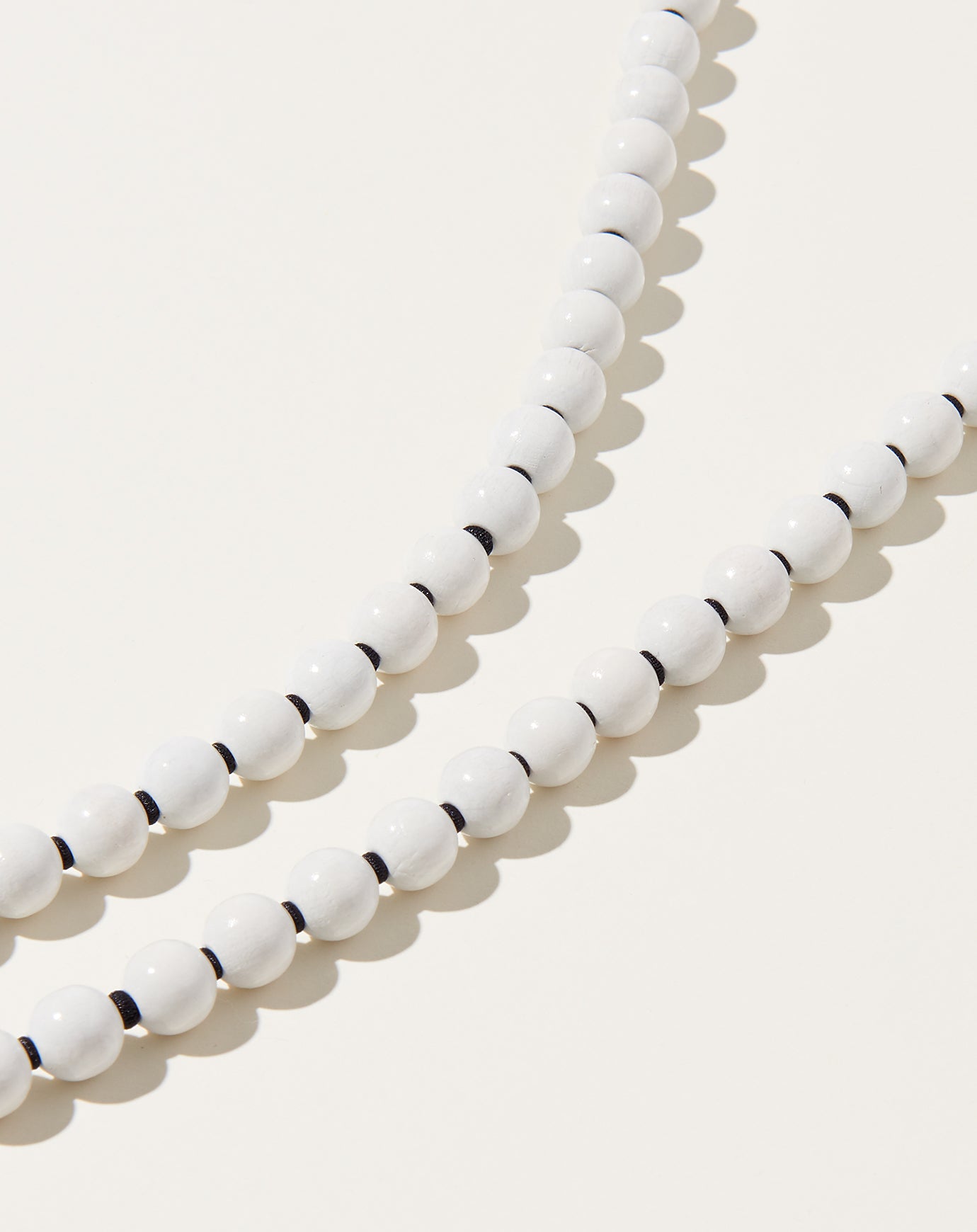 Ina Seifart Perlen Long Keyholder in White on Black