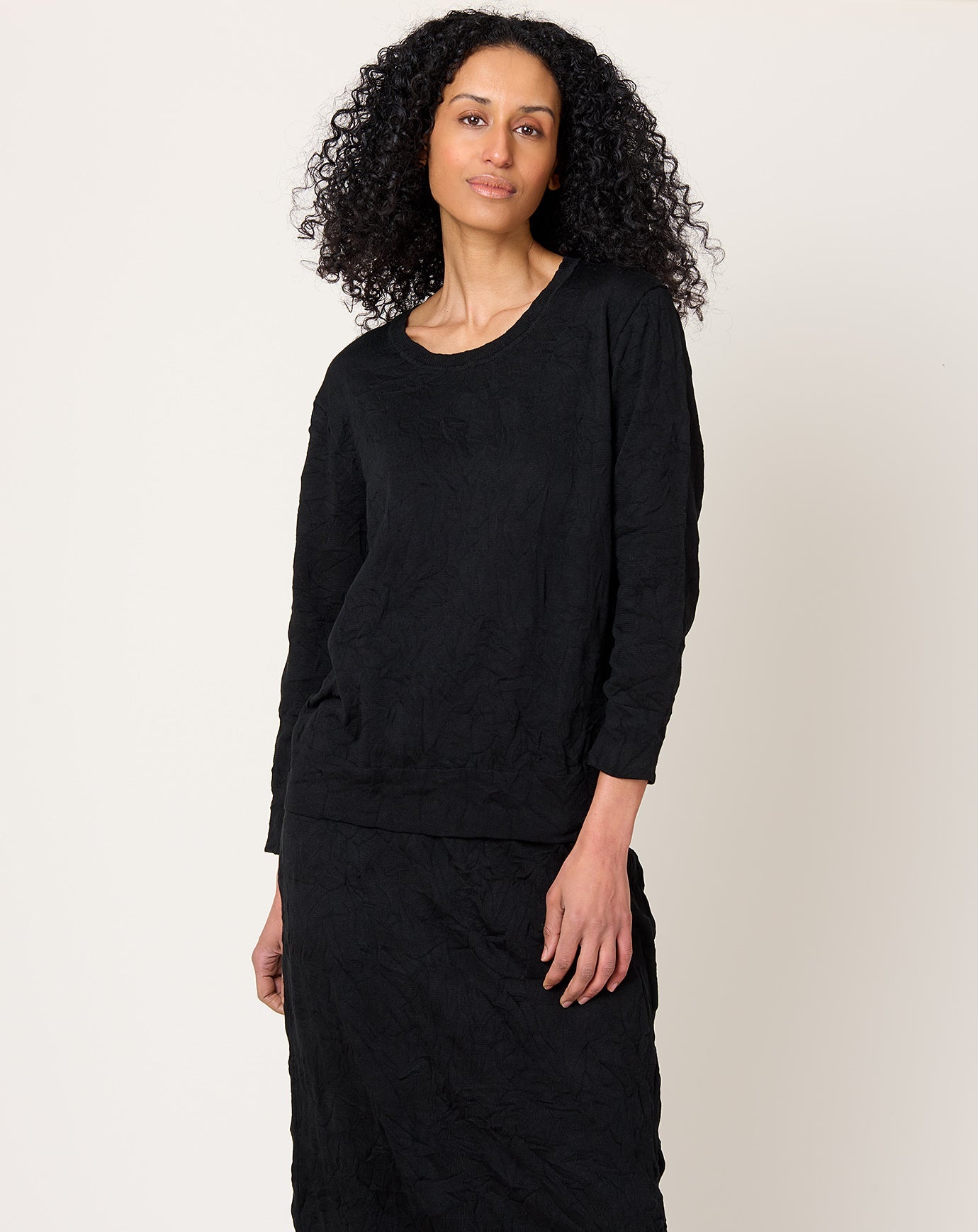 Black Crane Crinkled Summer Knit Top in Black