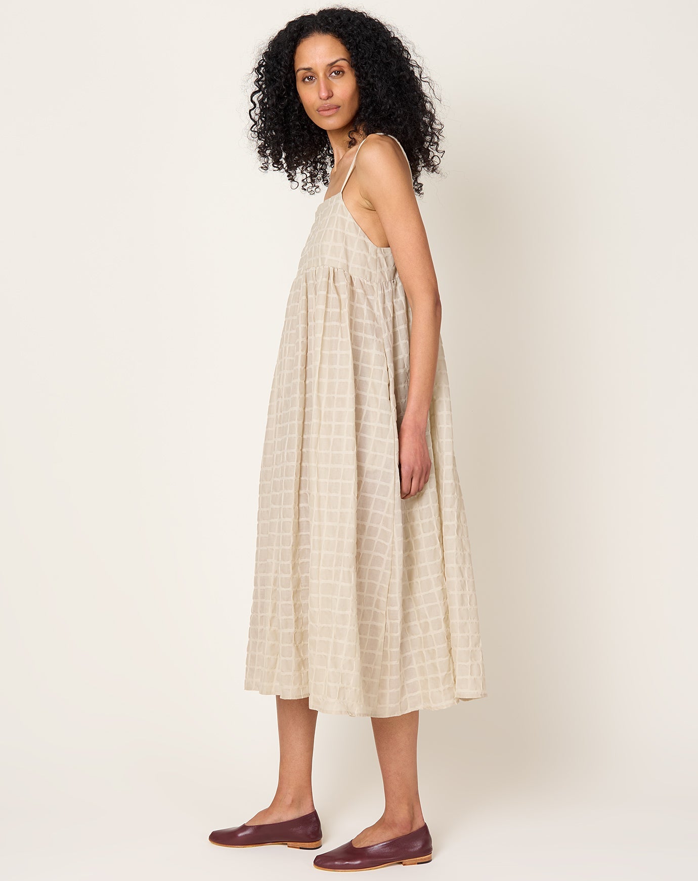 Black Crane Ripple Finish Strap Dress in Beige