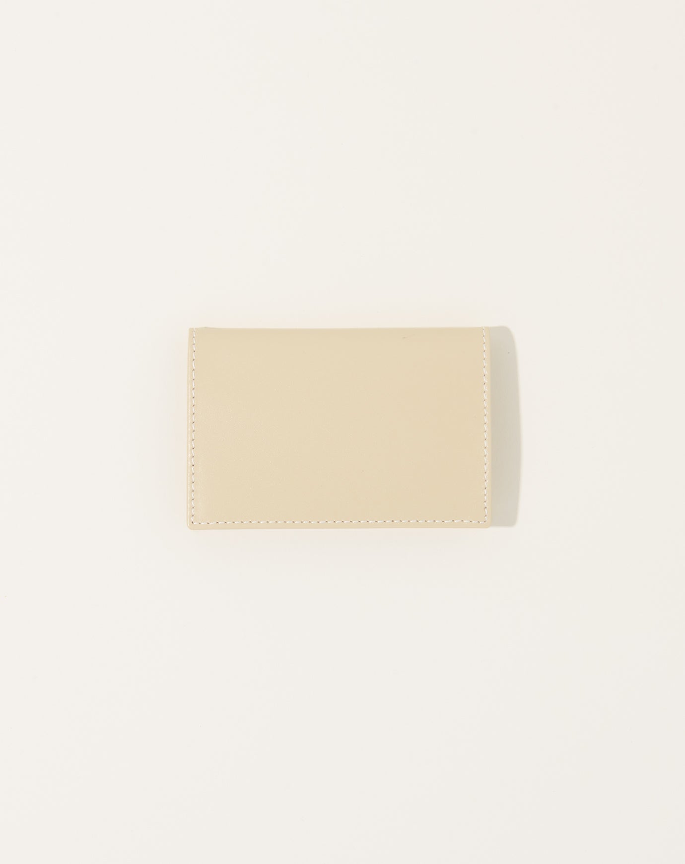 Comme des Garçons  Off White Bifold Wallet