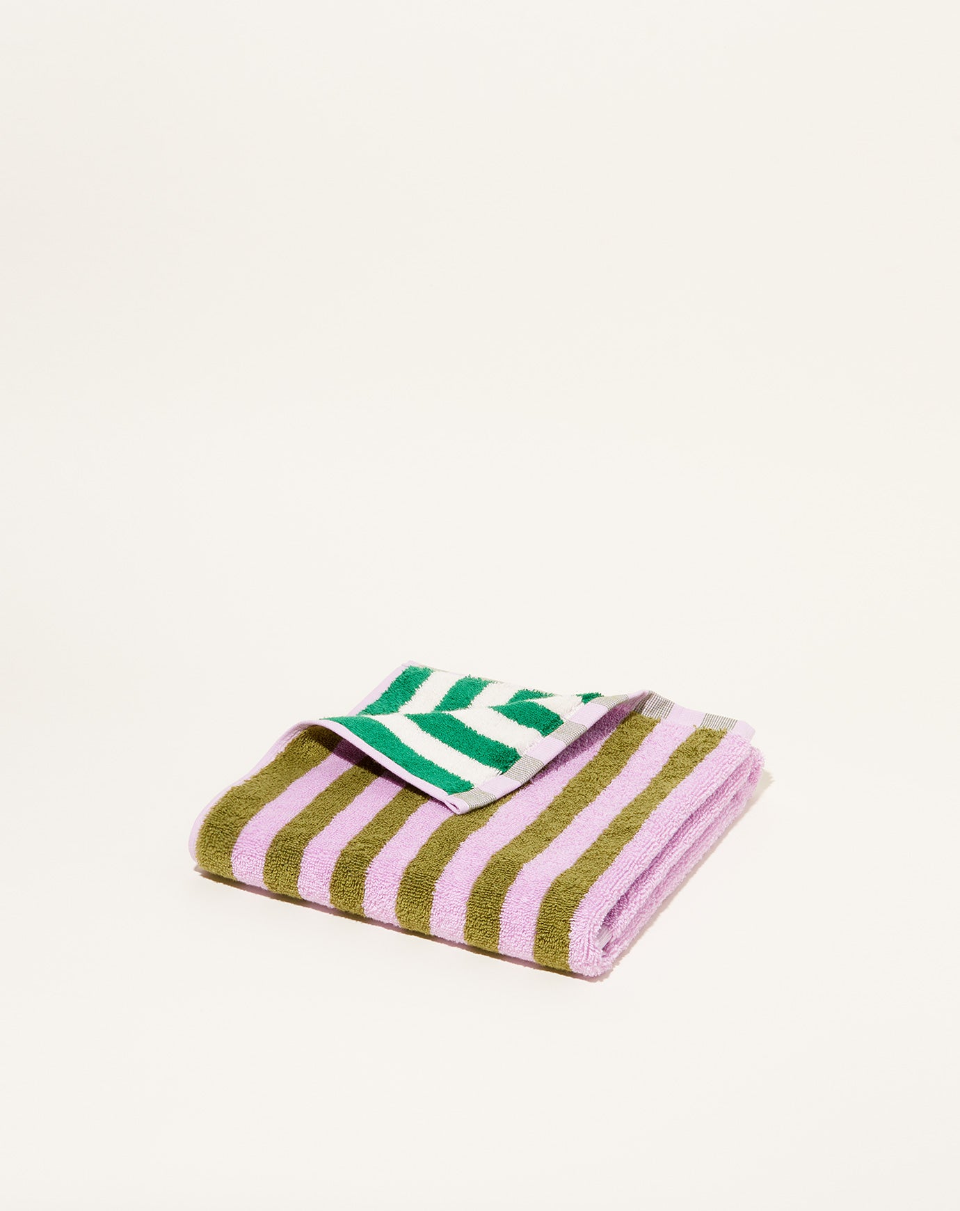 https://covetandlou.com/cdn/shop/files/dusen-dusen-hand-towel-in-sea-stripe_02.jpg?v=1697579367