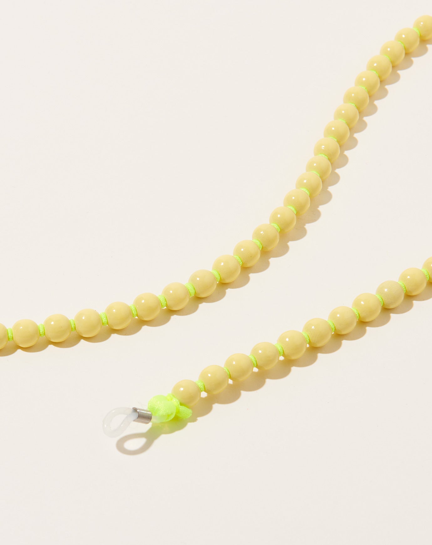 Ina Seifart Brillenkette Eyeglass Chain in Pastel Yellow on Neon Yellow