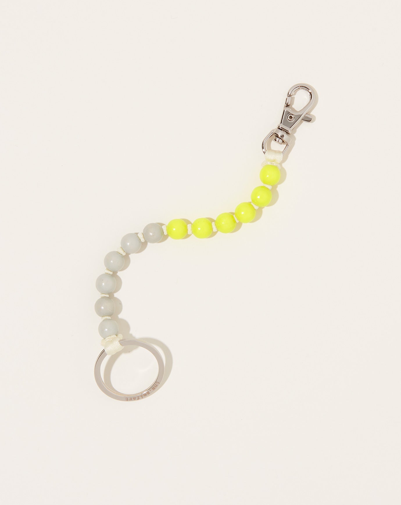 Ina Seifart Perlen Short Keyholder in Light Grey Neon Yellow and Opal