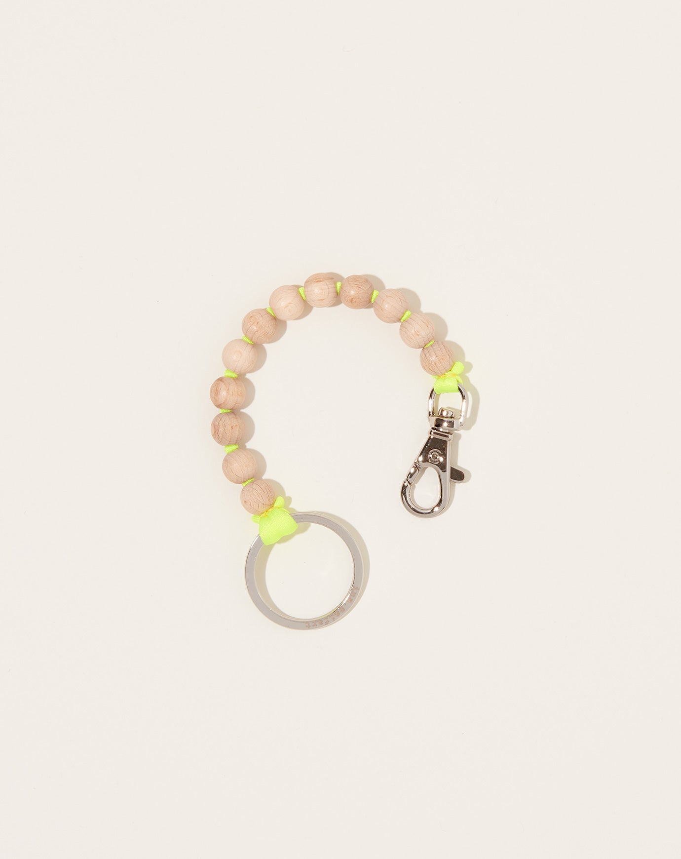 Ina Seifart Perlen Short Keyholder in Natural on Neon Yellow