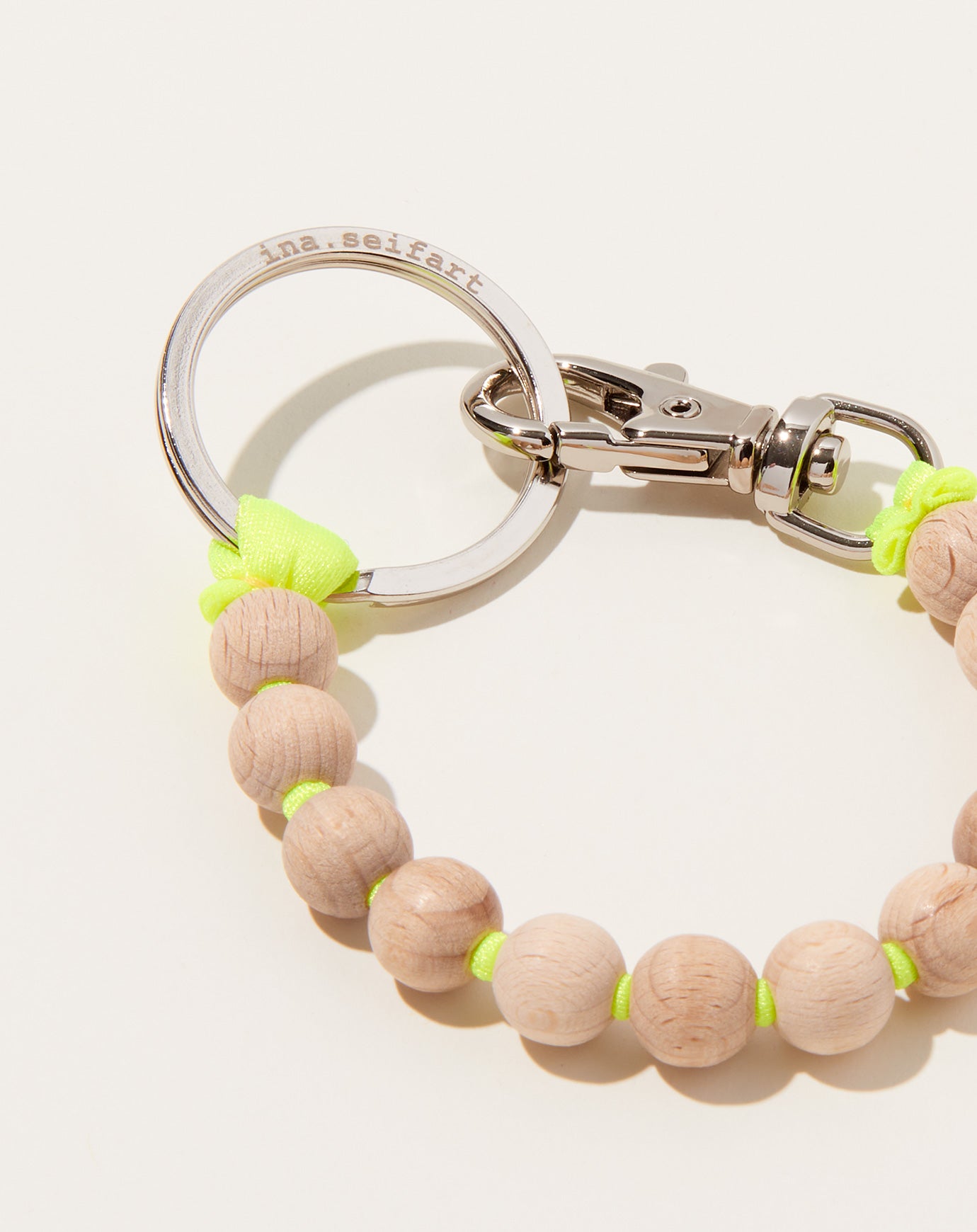 Ina Seifart Perlen Short Keyholder in Natural on Neon Yellow