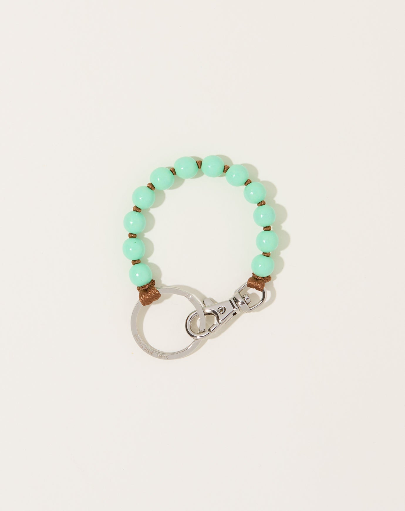 Ina Seifart Perlen Short Keyholder in Pastel Green on Mocha