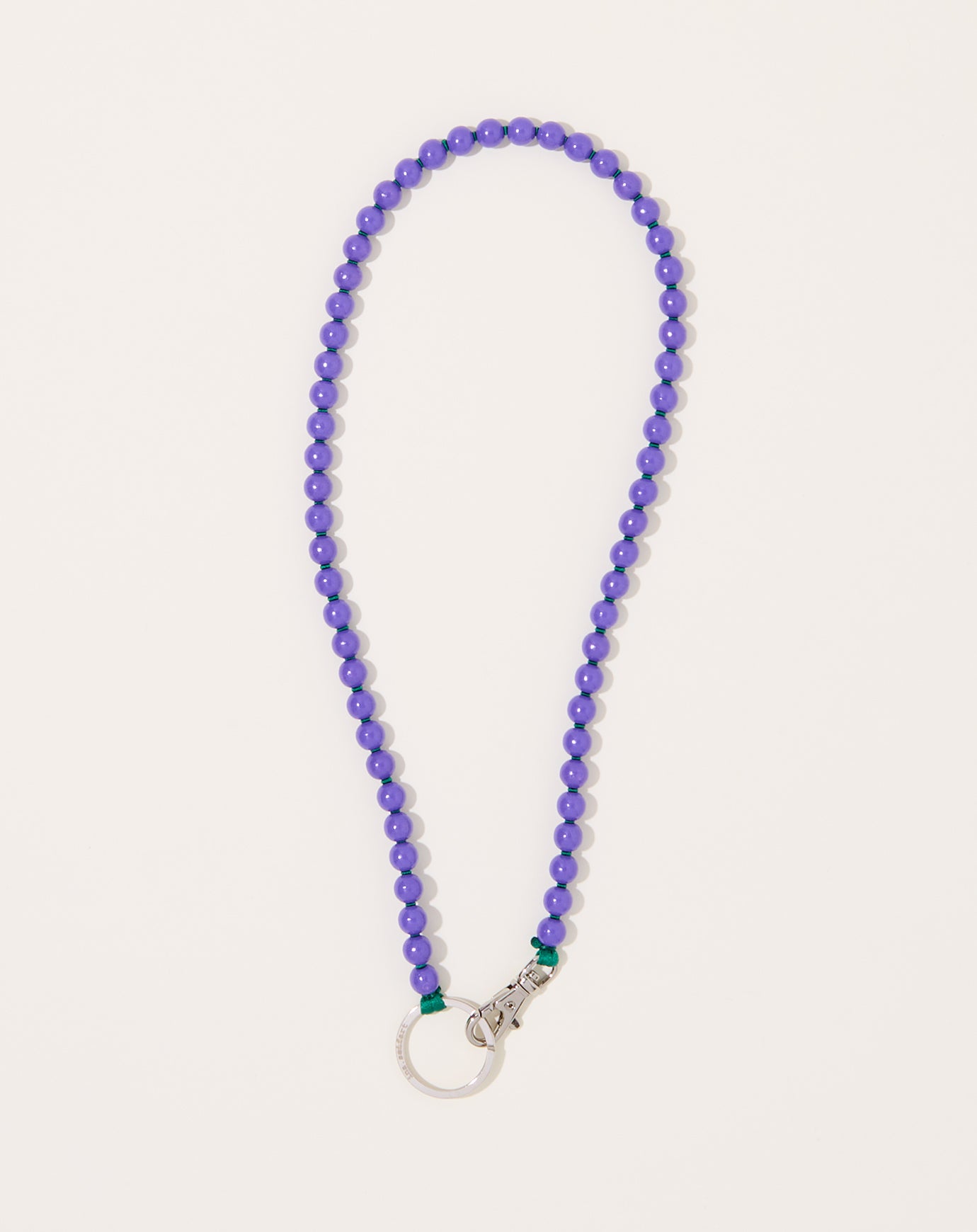 Ina Seifart Perlen Long Keyholder in Purple on Green