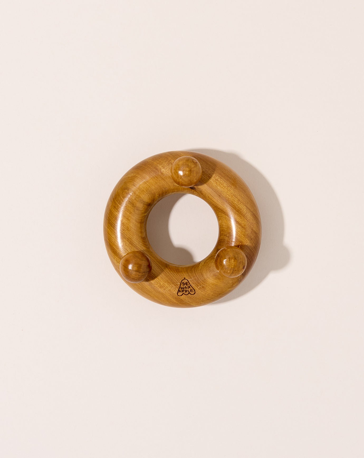 The Wax Apple Donut Massager
