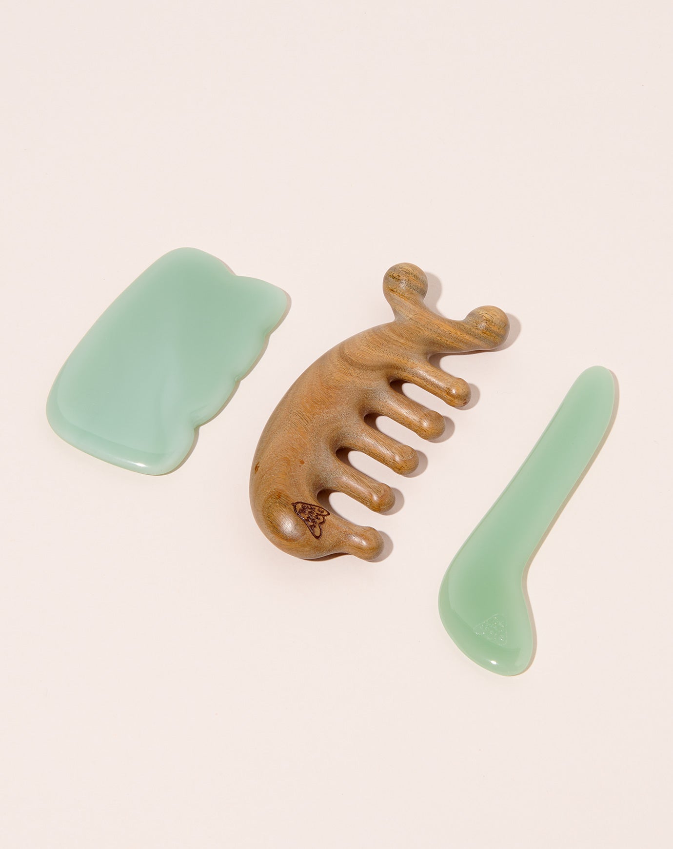 The Wax Apple Jade Paw Massager