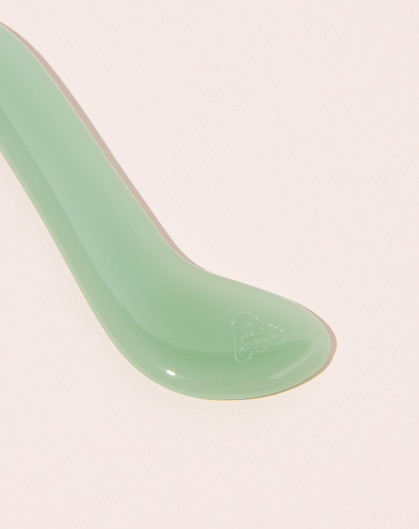 The Wax Apple Jade Paddle Massager