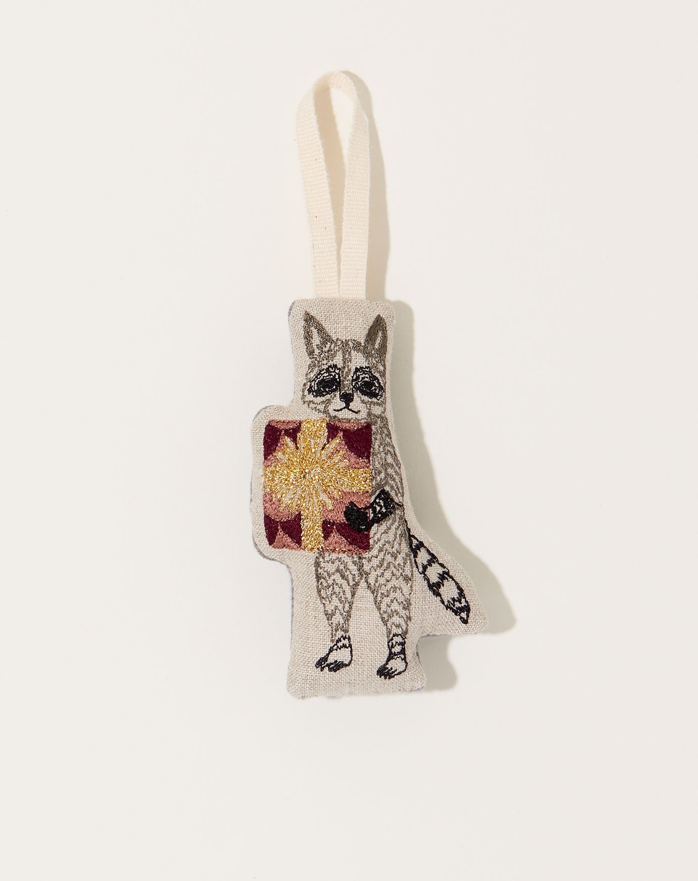 Coral & Tusk Raccoon with Present Ornament