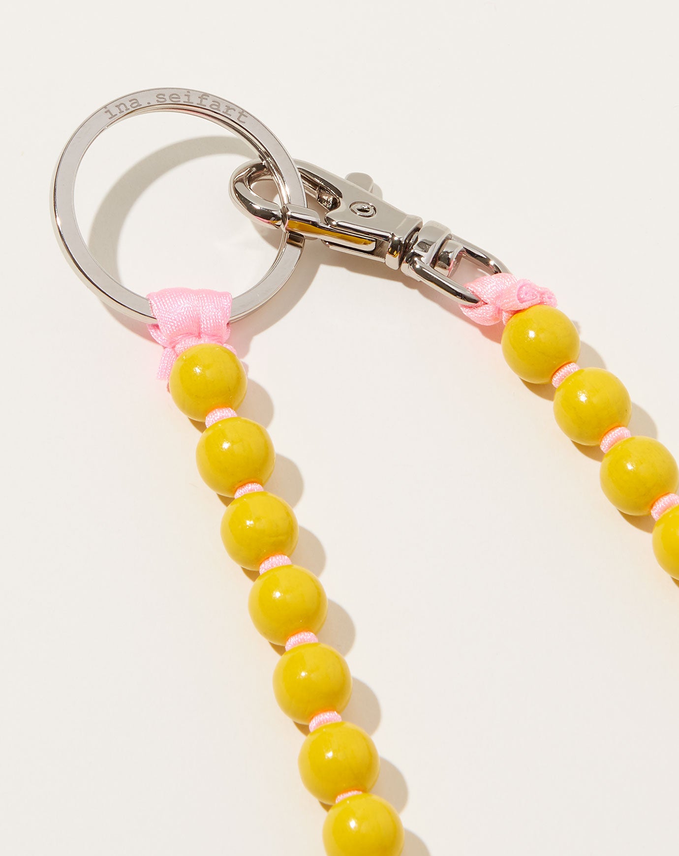 Ina Seifart Perlen Long Keyholder in Yellow on Rose