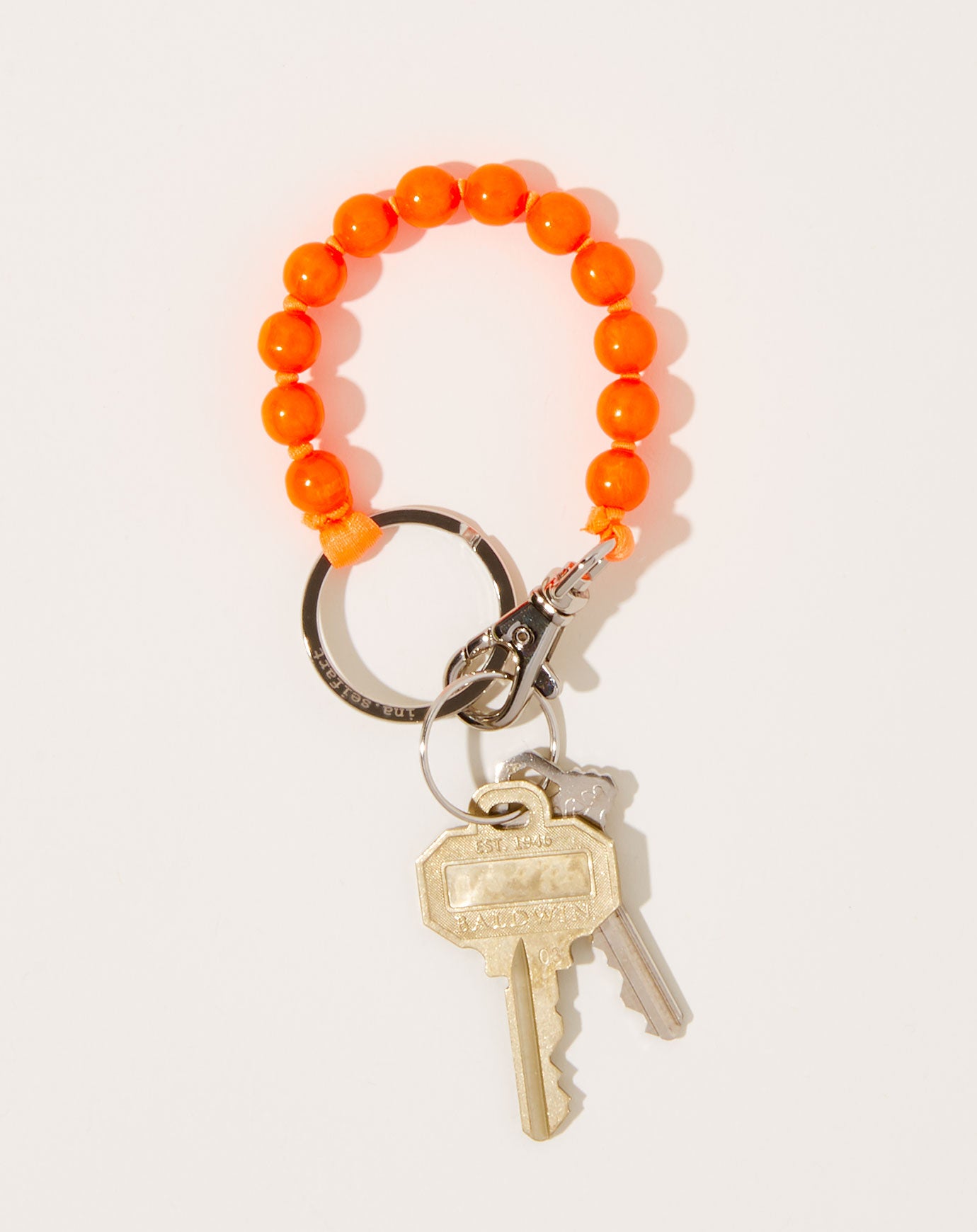 Ina Seifart Perlen Short Keyholder in Neon Orange