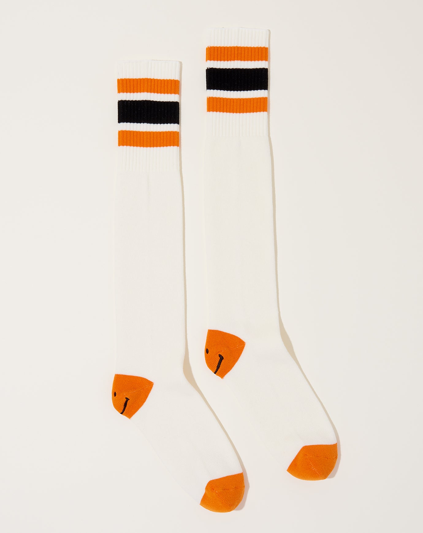 Kapital Heel Smilie Embroidered Skaters Knee-High Socks in White & Orange